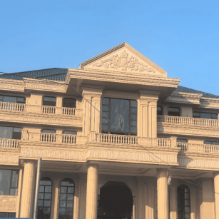 舟山黄金麻别墅外墙干挂石材效果示例