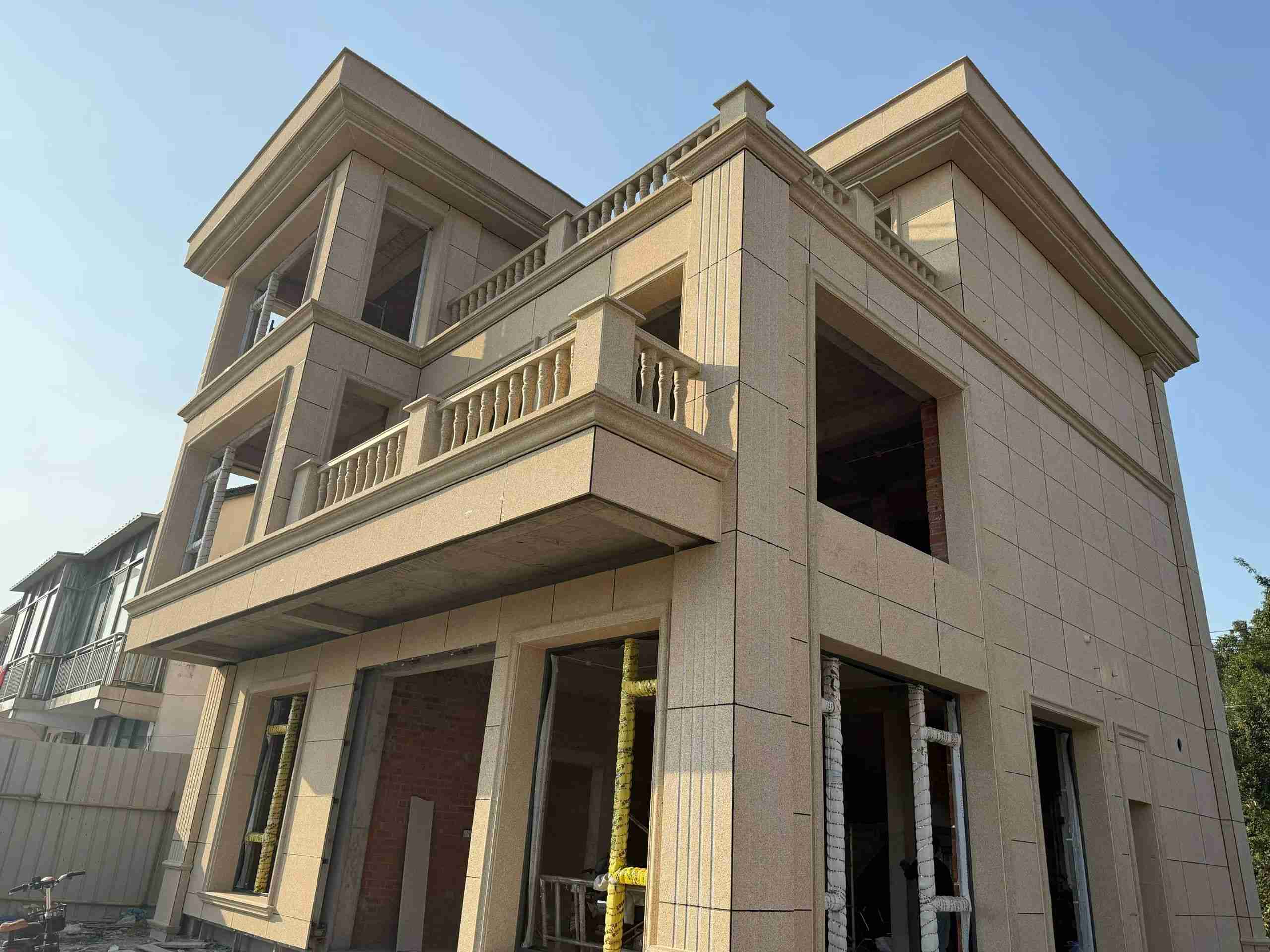 舟山 黄金麻花岗岩石材荔枝面外墙干挂效果展示